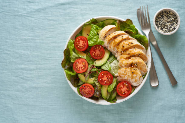 istock Keto salad with chicken meat sous vide, tomatoes, cucumbers, avocado 1297395995