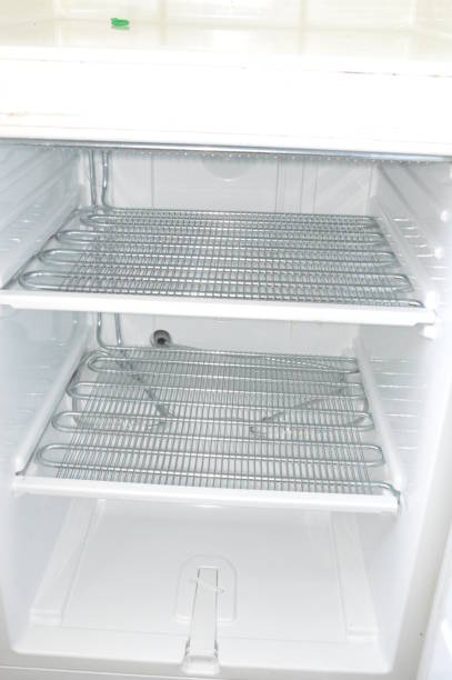 istock Refrigerator maintenance, repair and the defrosting 1297396102