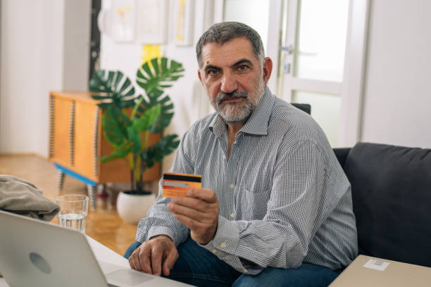 istock man shopping online from his home 1297396162