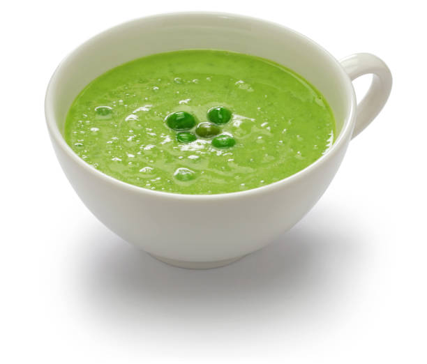istock fresh green pea soup isolated on white background 1297396900