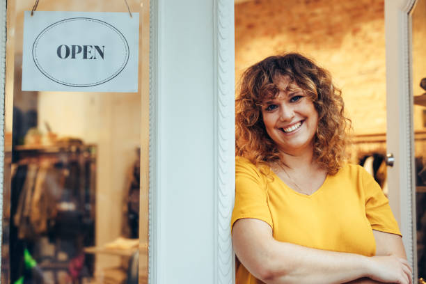 istock Clothing store owner 1297399454