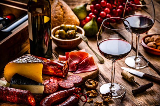 istock Spanish food: red wine, cheeses, sausages and Serrano ham. 1297401669