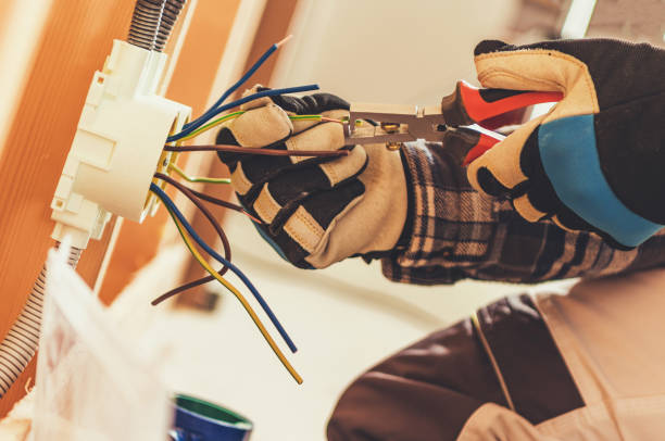 istock Electric Outlet Installation by Electrician 1297405699
