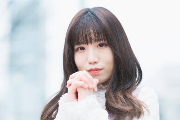 istock Young woman in prayer pose 1297407283