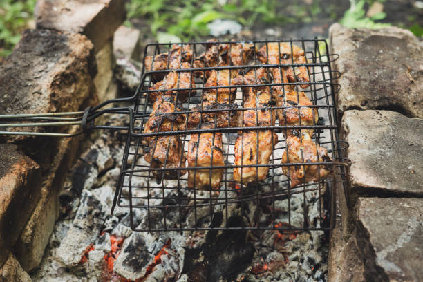 istock Delicious, juicy ribs are cooked over charcoal 1297409564