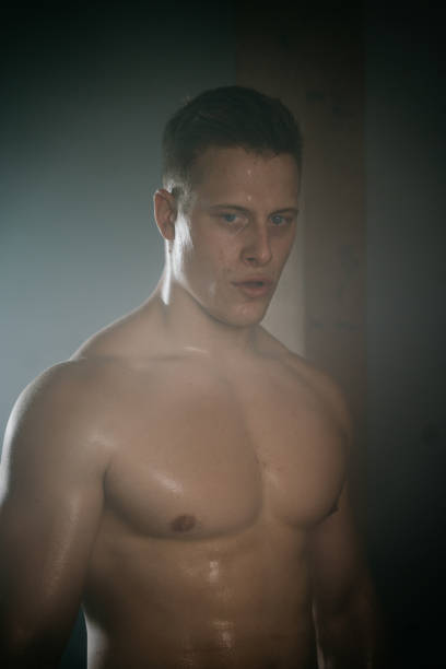 istock Shirtless muscular athlete 1297409866