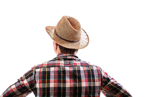 Rear view of man in cowboy hat