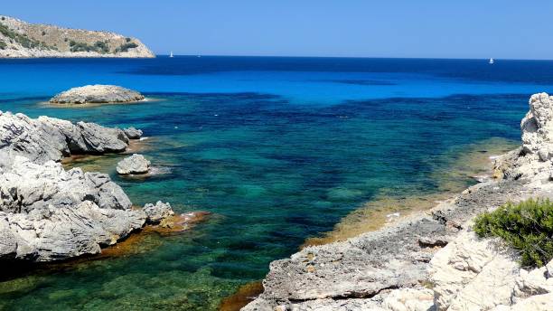 istock Rock Coastline and Crystal Clear Mediterranean Sea on Mallorca 1297413115