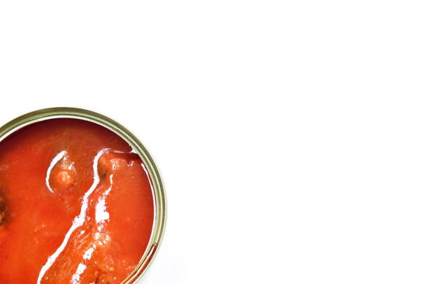 istock sardine or mackerel fish can food in ketchup package opened cap on white background 1297414991