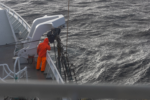 At Sea, Iceland - March 11, 2014. Tourists whale watching in the North Atlantic Ocean off the coast of Iceland.