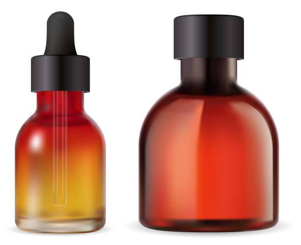 istock Cosmetic oil bottle. Essential oil bottle isolated 1297419911