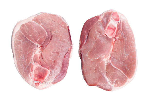 zwei scheiben rohes schweinefleisch isoliert auf weißem hintergrund, ansicht von oben - schnitzel cutlet meat isolated on white stock-fotos und bilder
