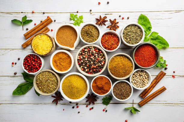 herbs and spices in bowels - herb imagens e fotografias de stock