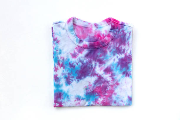 istock Tie-dye T-shirt on white background. Top view. 1297422136