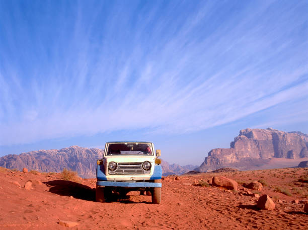 Four wheel drive in Wadi Rum desert Four wheel drive in Wadi Rum desert in Jordan"nThis Wadi Rum desert is well known by the book Lawrence of Arabia written by T.E.Lawrence"n lawrence in arabia stock pictures, royalty-free photos & images