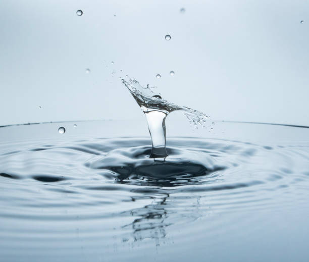 istock Freeze water liquid drop splash on pure background 1297429142