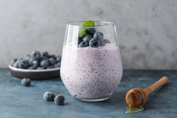 Blueberry chia pudding with fresh berries and honey