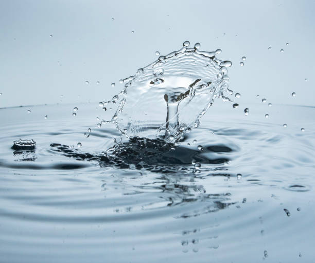 istock Freeze water liquid drop splash on pure background 1297429234