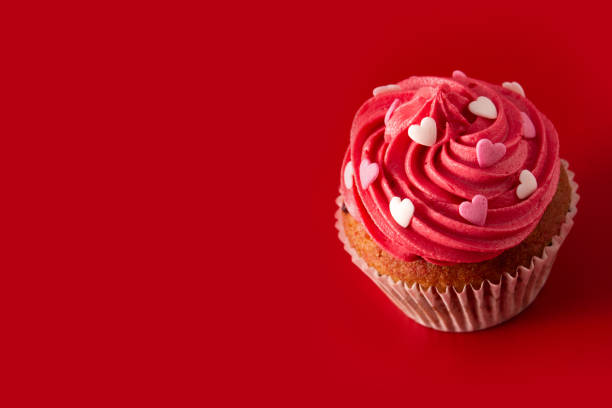 istock Cupcake decorated with sugar hearts for Valentine's Day 1297432345