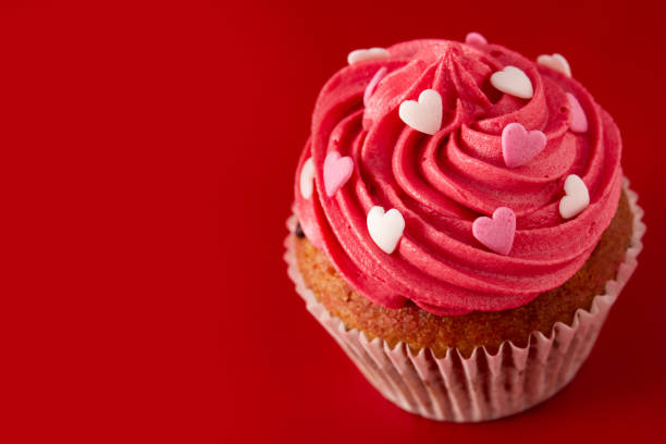 istock Cupcake decorated with sugar hearts for Valentine's Day 1297432371
