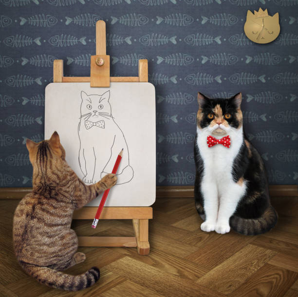 istock Cat artist paints his friend 1297432455