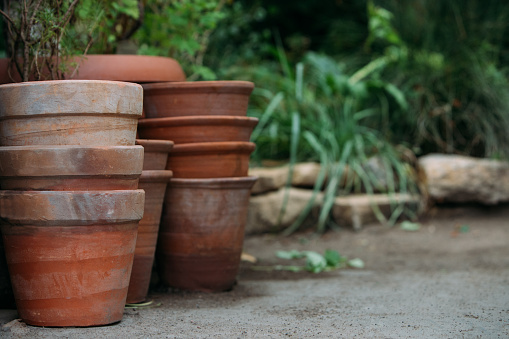 High angle view group of empty flower pots in the garden