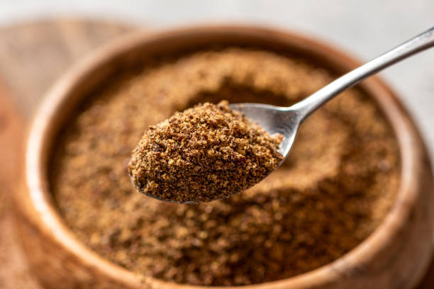istock Ground flaxseeds in a wooden bowl 1297438713