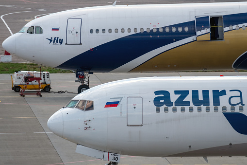 July 2, 2019, Moscow, Russia. Airplanes Boeing 767-300 Azur Air airline and Airbus A330-300 I Fly Airlines at Vnukovo airport in Moscow.