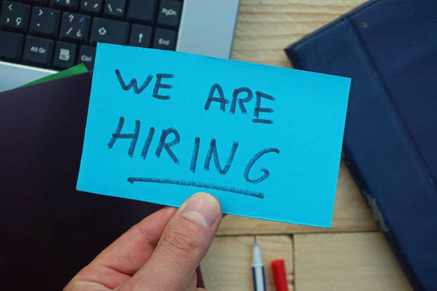 istock WE are hiring written on a memo 1297438957