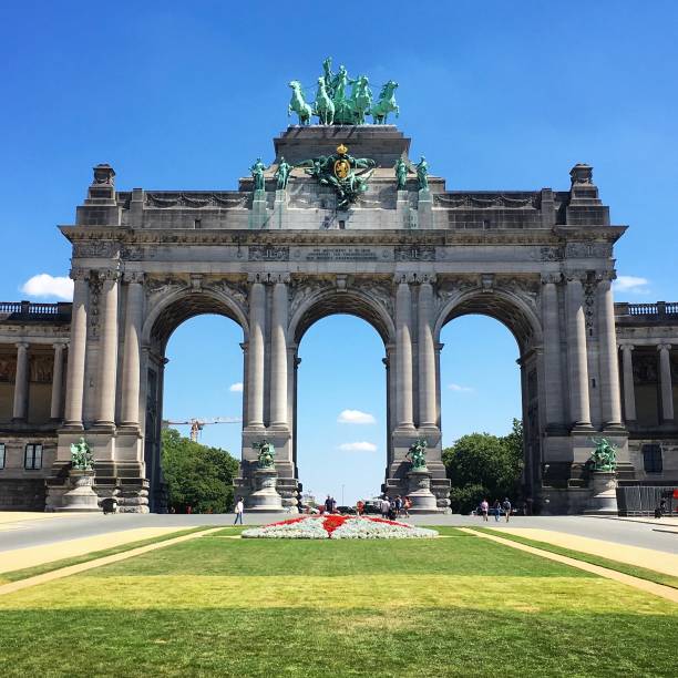The magnificent Cinquantenaire Arch in Brussels. The grand arch in the Belgium Parc du Cinquantenaire really is impressive. triumphal arch photos stock pictures, royalty-free photos & images