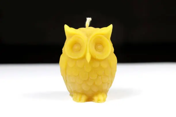 Photo of Handmade owl candle made of honey beeswax