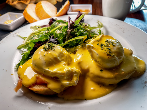 A Delicious Breakfast Of Eggs Benedict With Salmon In A Quaint Little Restaurant In Chihuahua, Mexico