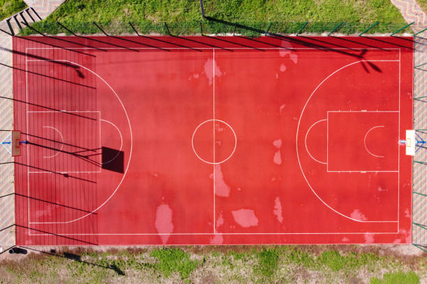 istock empty basketball play ground top view from drone 1297448242