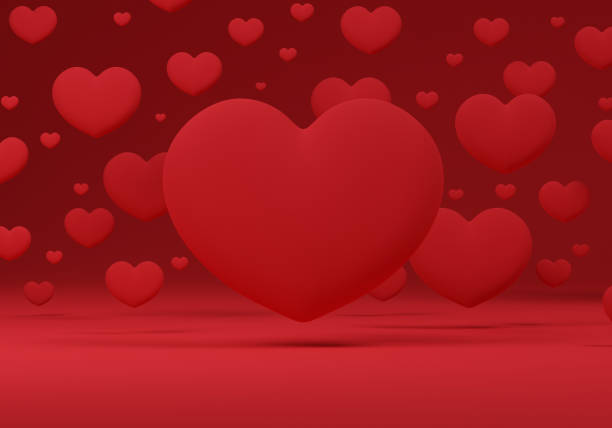 istock 3d hearts floating on a red background.3D Illustration. 1297449464
