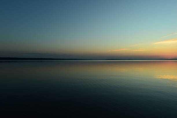 Calming twilight view on the lake with blue water