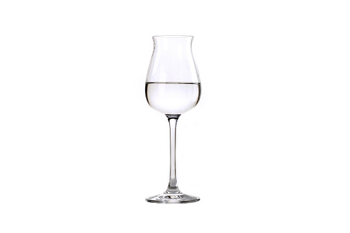 italian grappa glass or vodka glass,isolated on white background, central position