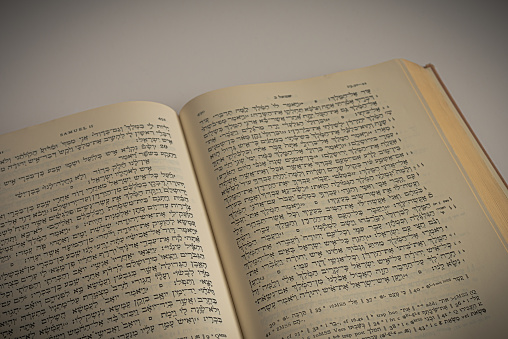 Book spread of a hebrew bible with the Masoretic Text on a white background, Denmark, January 20, 2021