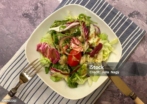 Healthy Mixed Salad With Eisberg Arugula Radicchio Cherry Tomato And Balsamic Dressing Stock Photo - Download Image Now