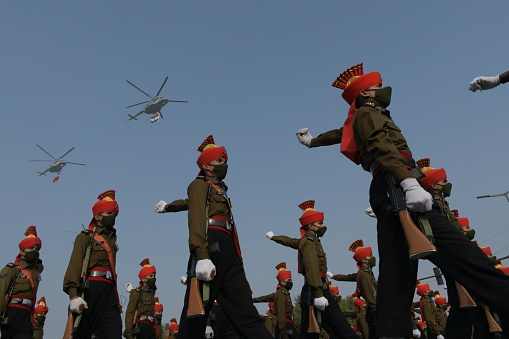 New Delhi 20 January 2021 : Indian soldiers and Air Force helicopter participate in a rehearsal for upcoming Republic Day parade in New Delhi, India. 20 January 2021