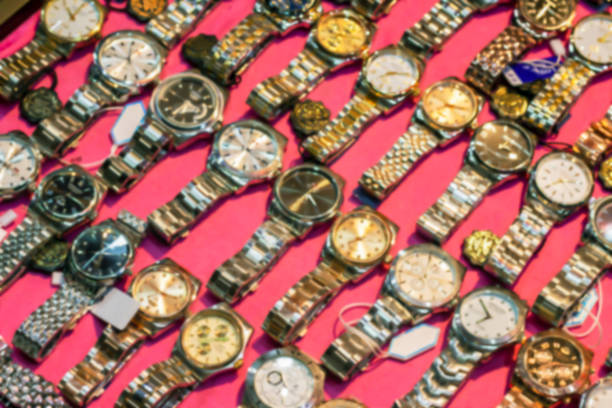 istock Blurred watch wrist in shop for background, Clock blur image 1297453792
