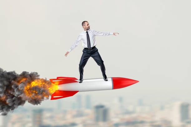 istock man riding a big missile over the city. 1297454869