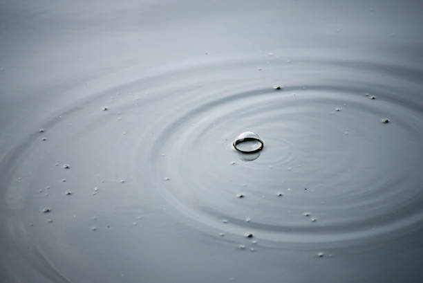 istock bubble on the water surface of river 1297456148