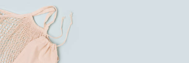 istock Banner with reusable textile bags on a blue background. 1297457591