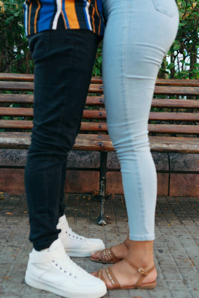 istock Unrecognizable couple embraced in the park 1297459037