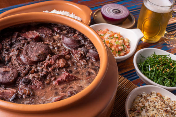 istock Feijoada, typical Brazilian food with black beans, pork and sausage 1297460262