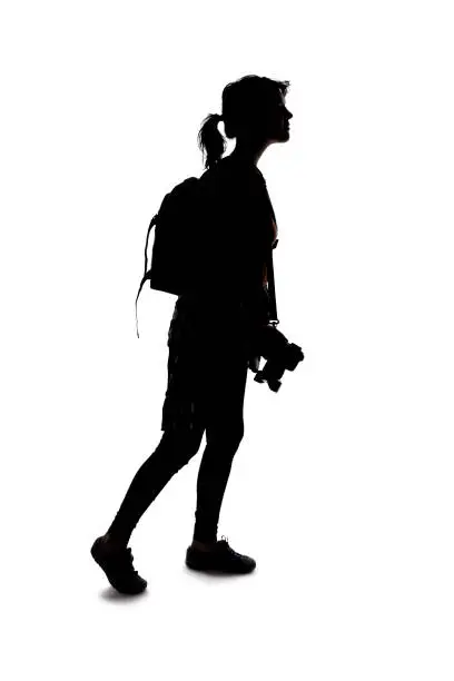 Photo of Silhouette of a Hiking Photographer