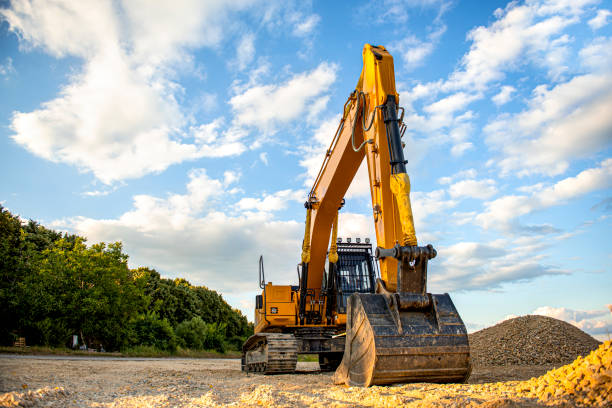 istock Excavator prepares the ground for construction stock photo 1297460467