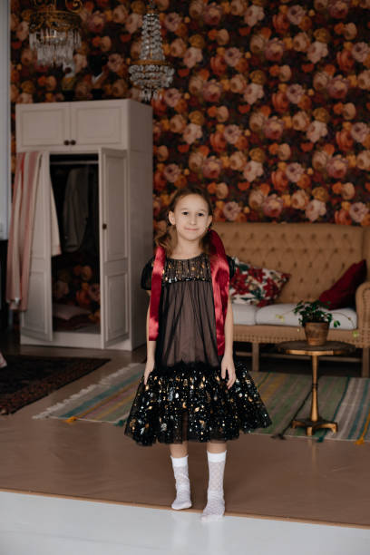 istock A child in a room with beautiful wallpaper. 1297461375