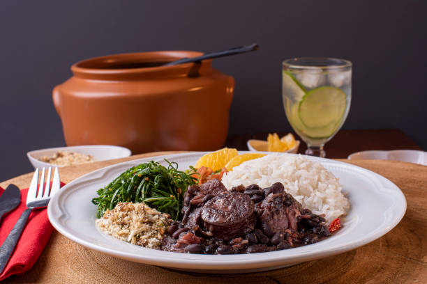 istock Feijoada, typical Brazilian food with black beans, pork and sausage 1297462112