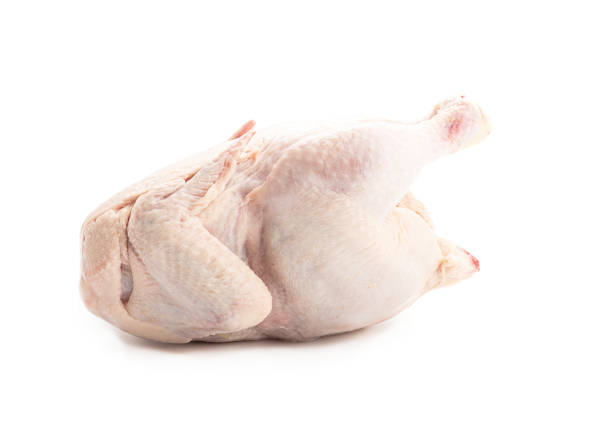 istock Whole fresh raw chicken isolated on white background. 1297462233